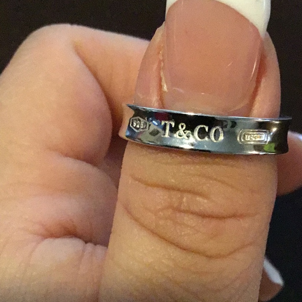 Tiffany & Co. Silver Jewelry Ring with Polished Finish and Engraving